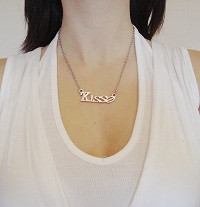 Pendentif argenté strass Kisse